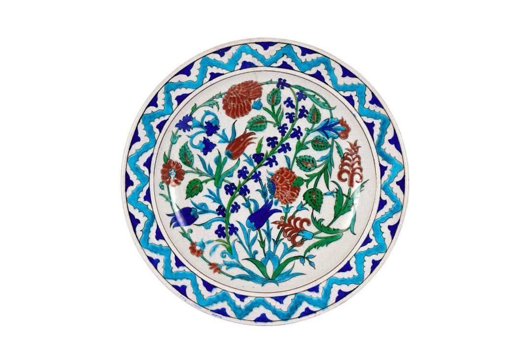 THEODORE DECK: A 19TH CENTURY IZNIK STYLE POTTERY CHARGER - Image 1 of 3