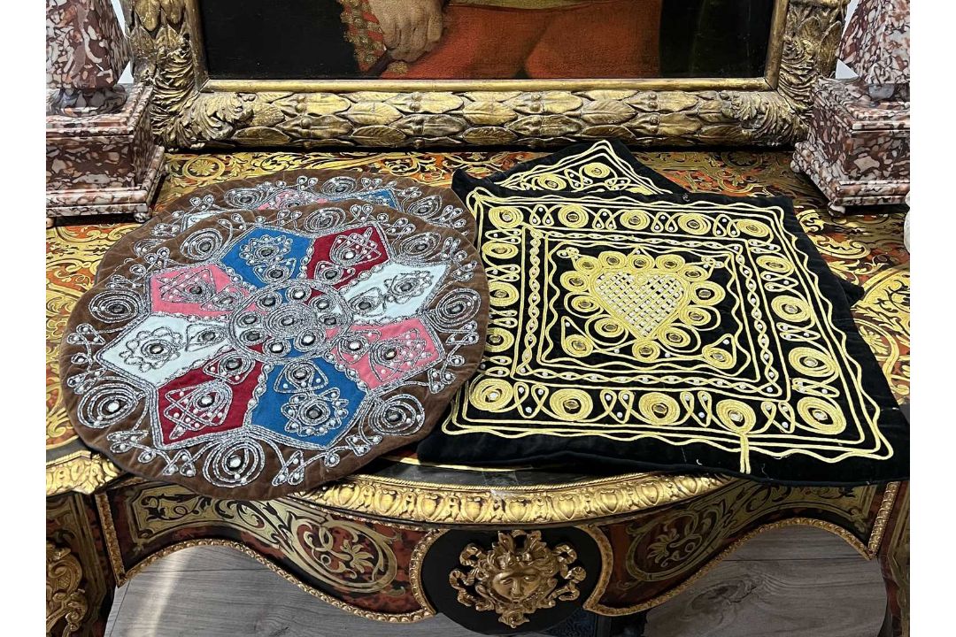 FOUR MIDDLE EASTERN EMBROIDERED VELVET CUSHION COVERS