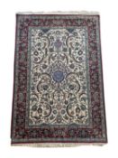 A FINE PART SILK ISFAHAN RUG