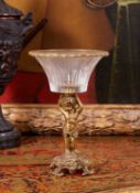 AN EMPIRE STYLE GILT BRONZE AND GLASS FIGURAL CENTREPIECE