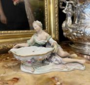 MEISSEN: A 19TH CENTURY PORCELAIN FIGURAL SALT DISH