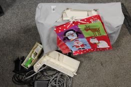 A VINTAGE BROTHER SEWING MACHINE WITH SOME ACCESSORIES