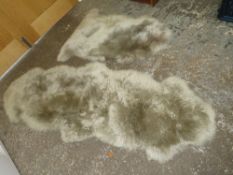TWO MODERN DUNELM SHEEPSKIN RUGS