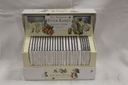 A BOXED COMPLETE COLLECTION OF BEATRIX POTTER WORLD OF PETER RABBIT SET OF BOOKS