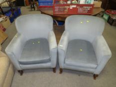 A PAIR OF VINTAGE UPHOLSTERED ARMCHAIRS