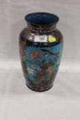 A DECORATIVE CLOISONNE VASE WITH BIRDS AMONGST FLOWERS
