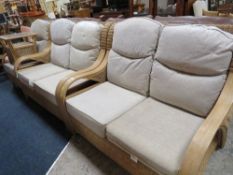 A MODERN FOUR PIECE RATTAN CONSERVATORY SUITE
