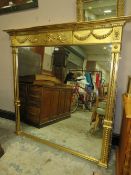 A LARGE MODERN GILT FRAMED OVERMANTLE MIRROR 145 X 145 CM