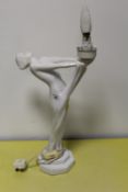 A CERAMIC FIGURATIVE NUDE TABLE LAMP
