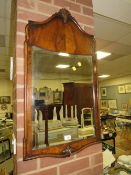 AN EARLY 20TH CENTURY WALNUT HANGING WALL MIRROR 91 X 51 CM