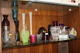 A LARGE COLLECTION OF STUDIO GLASS ETC TO INCLUDE VASES, CANDLE HOLDERS, WINE GLASSES ETC