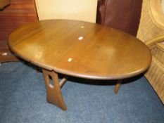 A SMALL ERCOL DROPLEAF TABLE