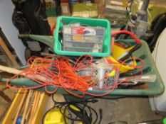A LARGE PLASTIC WHEEL BARROW WITH ASSORTED CONTENTS