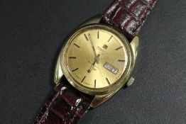 A VINTAGE TISSOT AUTOMATIC SEASTAR DAY DATE WRISTWATCH