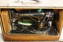 A CASED SINGER SEWING MACHINE
