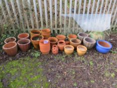 A LARGE QUANTITY OF ASSORTED TERRACOTTA AND GLAZED GARDEN PLANTERS