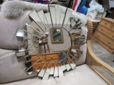 A MODERN CIRCULAR BEVELLED WALL MIRROR - DIA. 80 CM