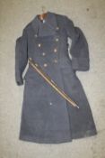 TWO VINTAGE SWAGGER STICKS TOGETHER WITH A VINTAGE RAF GREATCOAT IN WORN CONDITION