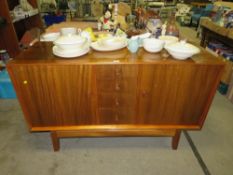 A RETRO TEAK SHAPED SIDEBOARD H-89 W-145 CM