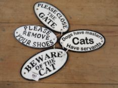 ***FOUR CAST METAL OVAL SIGNS **