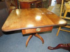 A 19TH CENTURY MAHOGANY PEMBROKE TABLE RAISED ON A BALUSTER COLUMN