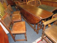 A LARGE 20TH CENTURY OAK DROPLEAF 'WAKE' TABLE H- CM W- CM WITH FIVE STUDDED LEATHER CHAIRS