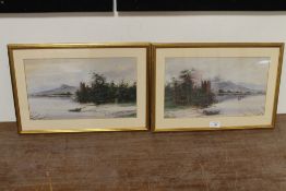 A PAIR OF GILT FRAMED AND GLAZED WATERCOLOURS OF LAKESIDE CASTLES BOTH SIGNED LOWER LEFT ONE DATED