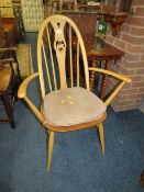 AN ERCOL 'SWAN' BACK BEECH CHAIR