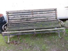 A LARGE WOOD AND CAST GARDEN BENCH A/F L- CM