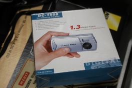 A TRAY OF CAMERAS AND ACCESSORIES