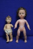 A GOEBEL DOLL TOGETHER WITH ANOTHER