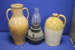 STONEWARE FLAGON, STONEWARE JUG AND A PARAFFIN LAMP
