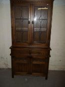 AN OLD CHARM OAK BOOKCASE