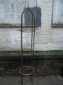 A STEEL GARDEN OBELISK