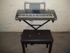 A YAMAHA PS 1500 ORGAN AND STAND