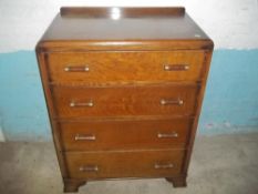 AN OAK 4 DRAWER CHEST