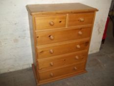 A SOLID PINE CHEST OF DRAWERS