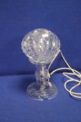 A GLASS TABLE LAMP