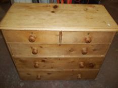 AN ANTIQUE PINE CHEST OF DRAWERS