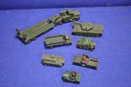 A COLLECTION OF DINKY MILITARY TRUCKS TO INCLUDE A TANK