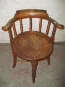 AN ANTIQUE SMOKERS BOW STYLE CHAIR