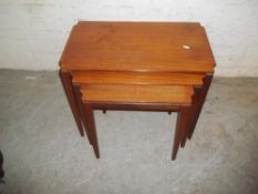 A RETRO TEAK NEST OF 3 TABLES
