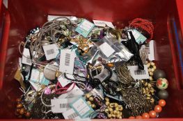 A BOX OF ASSORTED COSTUME JEWELLEREY