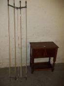 A SMALL OAK 2 DOOR CUPBOARD AND A VINTAGE CLOTHES AIRER