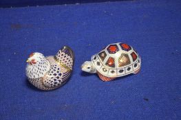 TWO ROYAL CROWN DERBY PAPERWEIGHTS WITH SILVER STOPPERS
