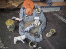A GARDEN WATER FEATURE AND A COLLECTION OF GARDEN POTS