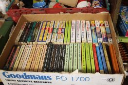 A TRAY OF PAPERBACK BOOKS (TRAY NOT INCLUDED)