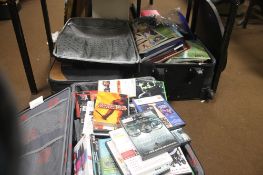 TWO CASES OF ASSORTED MAGAZINES TOGETHER WITH A CASE OF DVDS