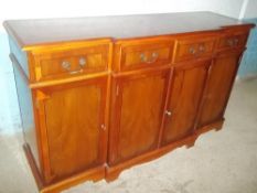 A YEW BREAK FRONT SIDEBOARD