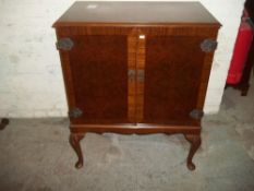 A REPRODUCTION DRINKS CABINET WITH CROSS BANDED DETAIL